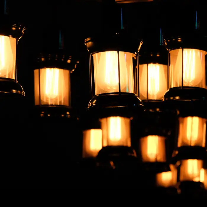 Decorative chandelier bulbs lit in a row